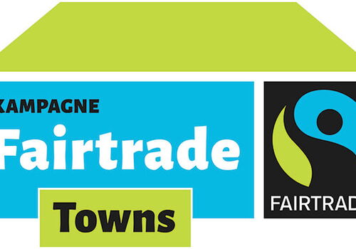 Logo der Kampagne Fairtrade Towns mit Fairtrade-Symbol